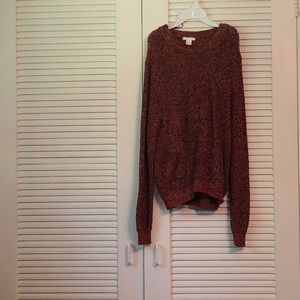 Orange and black knit long sleeve sweater